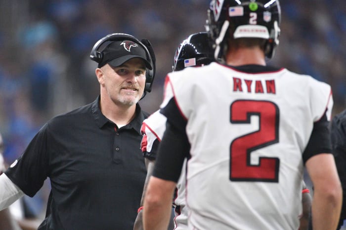 Sep 24, 2017; Detroit, MI, USA; Atlanta Falcons head coach Dan Quinn high fives quarterback Matt Ryan (2) during the fourth quarter against the Detroit Lions at Ford Field.